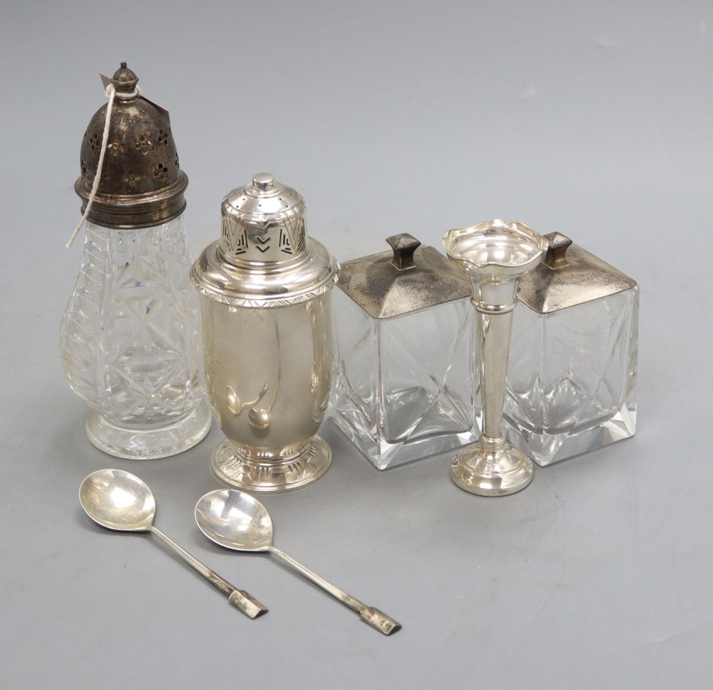 A pair of silver mounted jars, silver spoons, two sugar casters and a posy vase, tallest 18.5cm, 8.5oz.